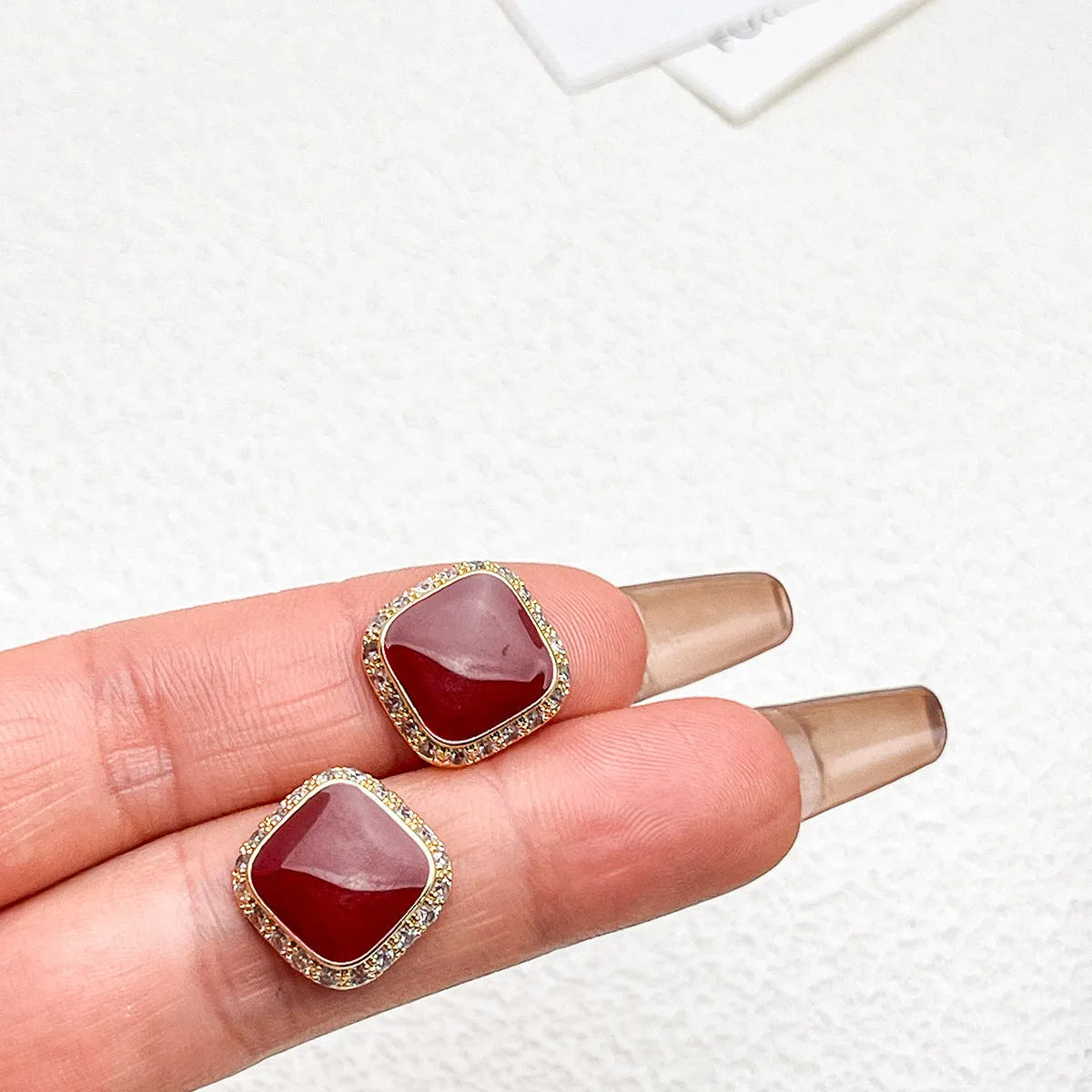 Red geometric square earrings with inlaid design, alloy construction with seiko treatment