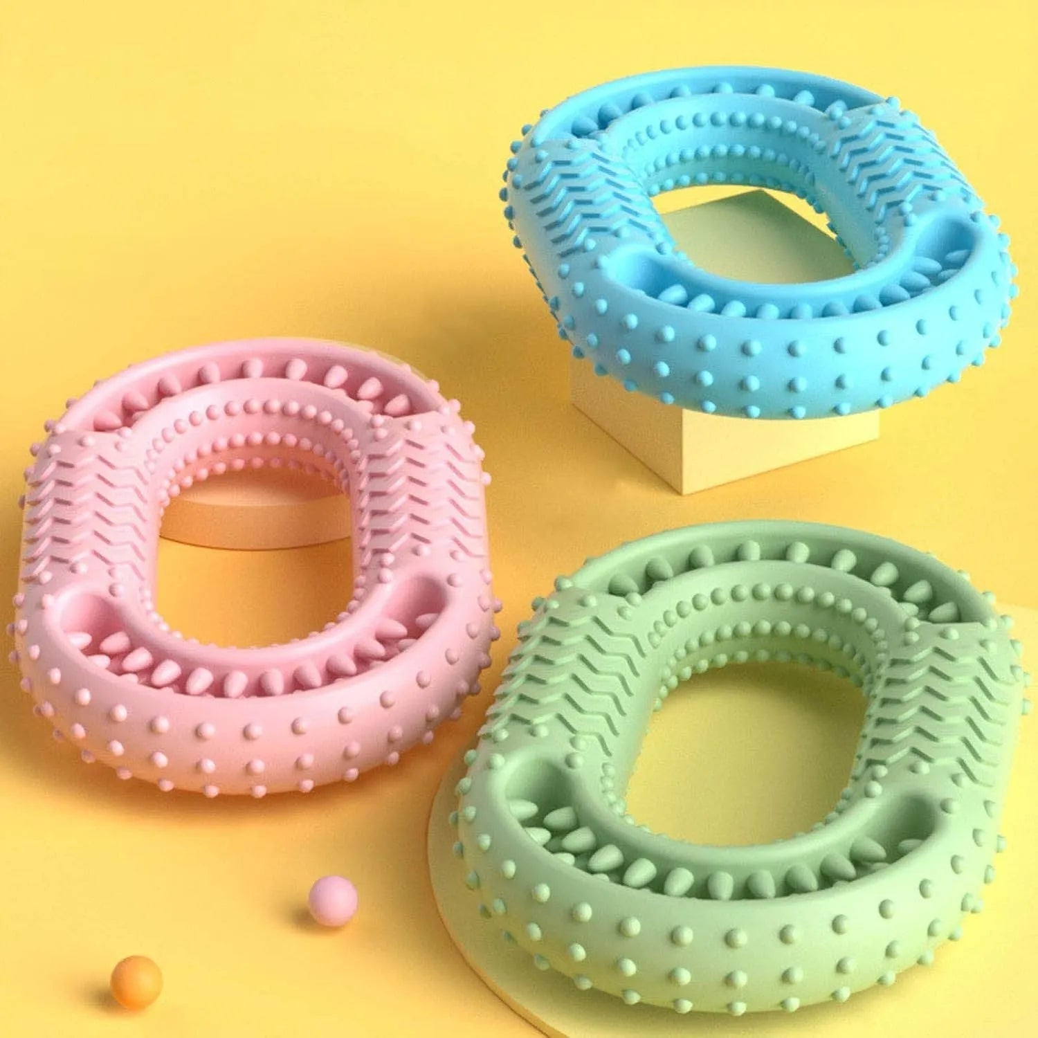 Blue O-ring shaped dog chewing toy for aggressive chewers on white background