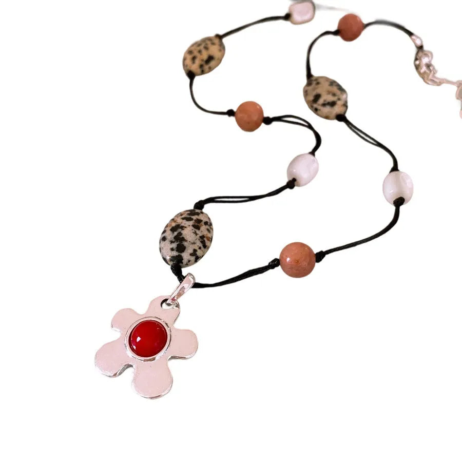 Stone shell beaded flower pendant necklace on alloy clavicle chain with electroplated finish in silver and gold tones