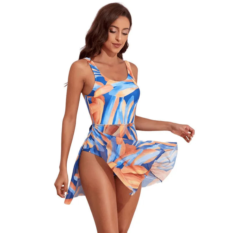 Women's one-piece swimsuit with single-shoulder slant design and digital floral print in coconut tree pattern