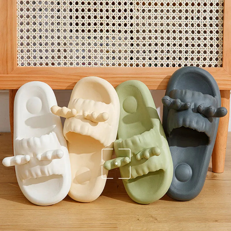 Cute deer horn design EVA flip flop slippers for women and men in light yellow, shown on a non-slip sole.