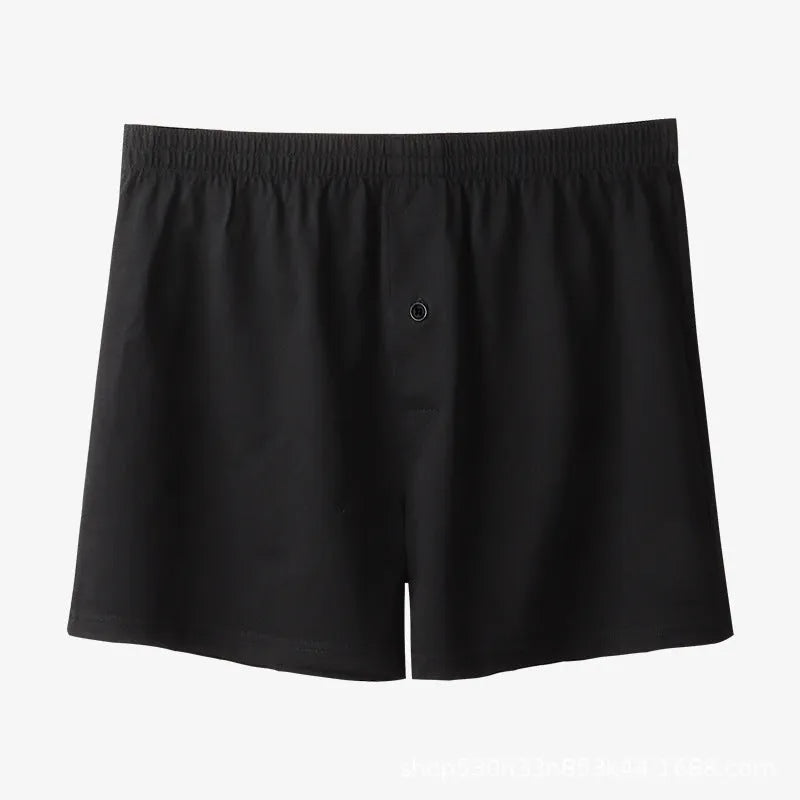 Men's light grey cotton boxer shorts with high waist and loose fitting design