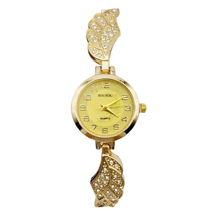 Women's stainless steel watch with round dial on wrist, showing gold surface colour option.