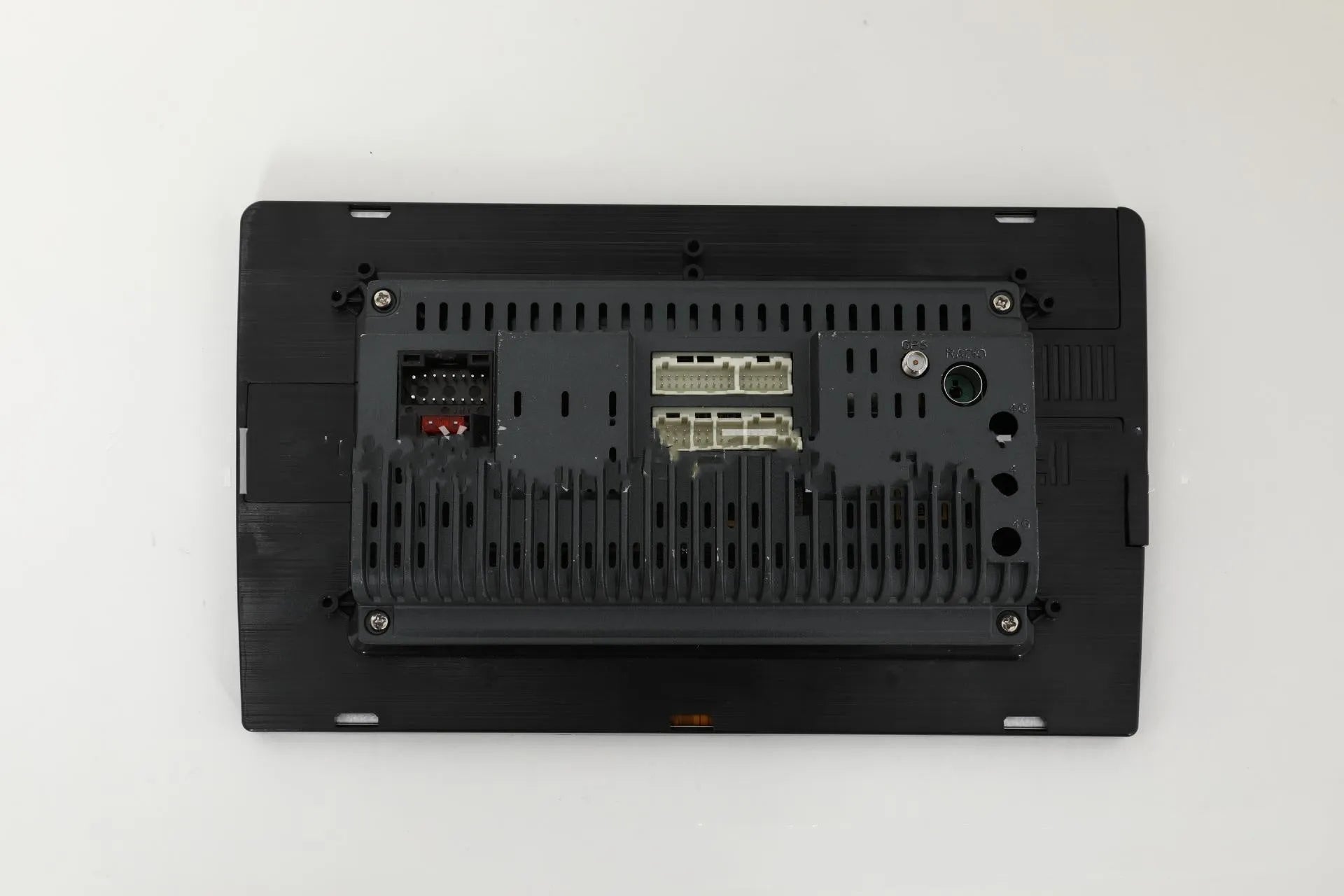 10.1 inch Android car stereo double din head unit with touch screen display and trapezoid panel design