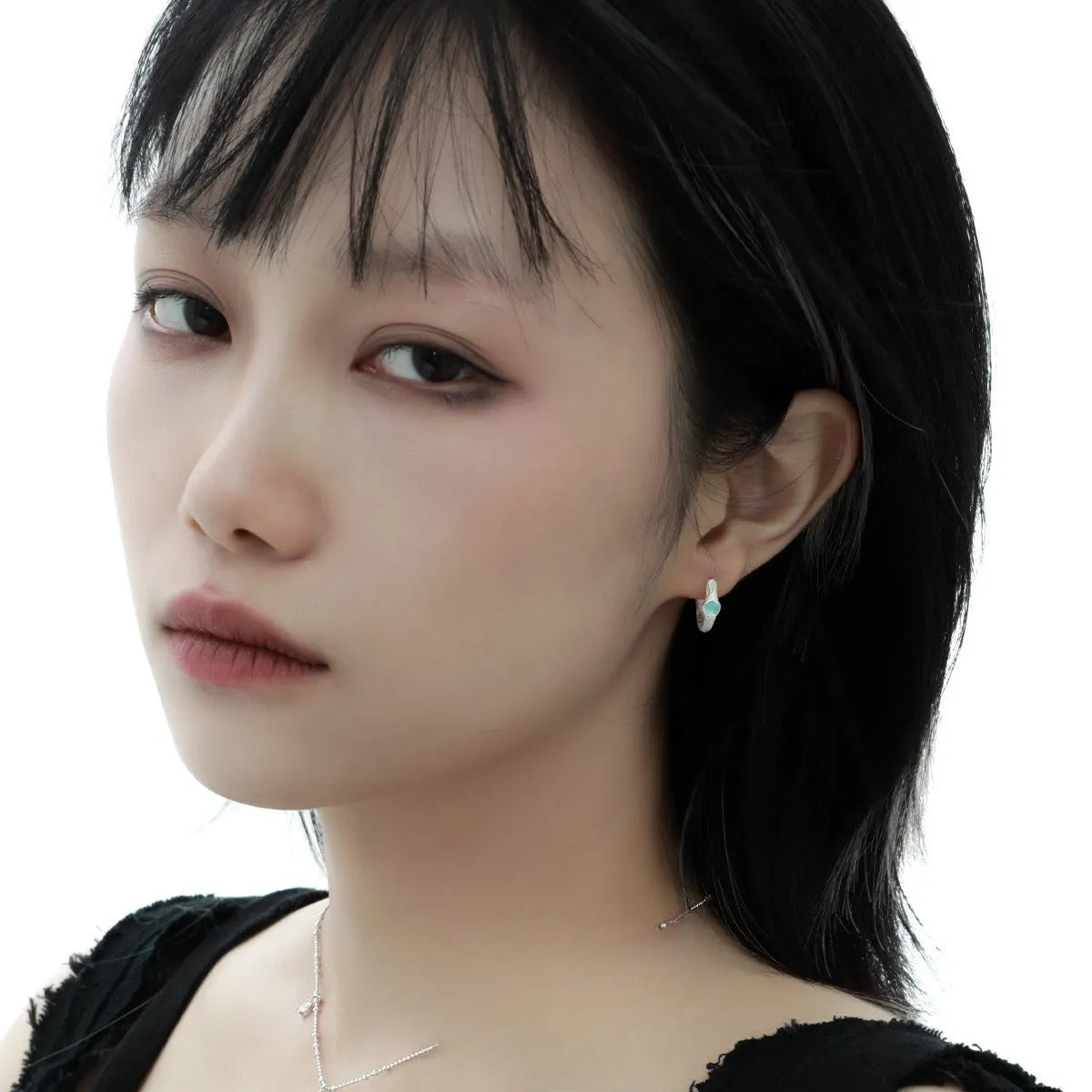 925 sterling silver geometric ear clip with burnt silver electroplating finish and circular design elements