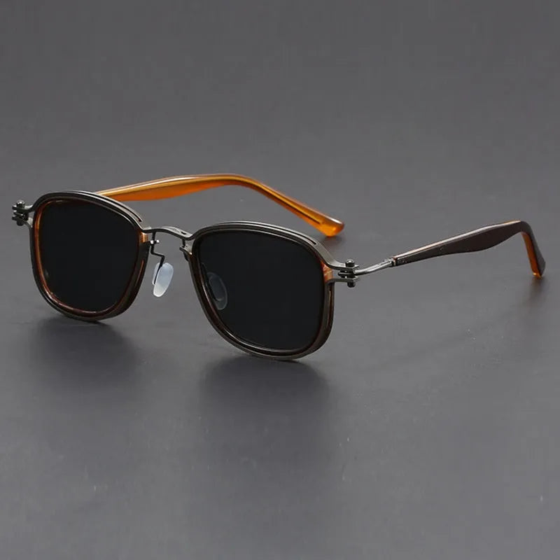 Retro style square frame sunglasses with metal arm details and tinted lenses in a two-tone colour finish.