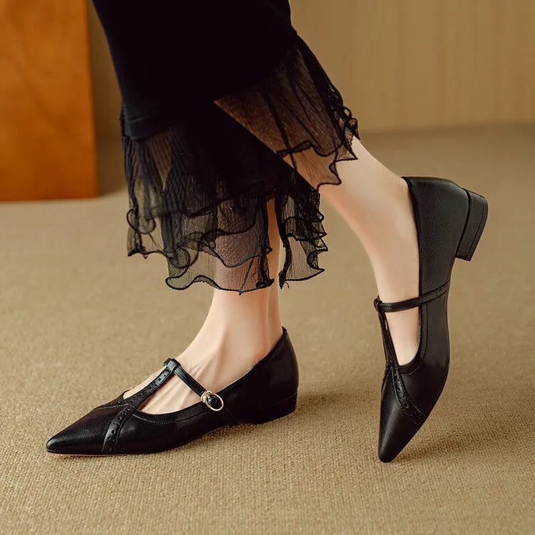 Brown leather women's low-cut flat shoes with round toe and mid heel on a white background.