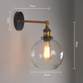 Retro round ball glass wall lamp with aluminium holder in amber, smoke grey, or transparent colour