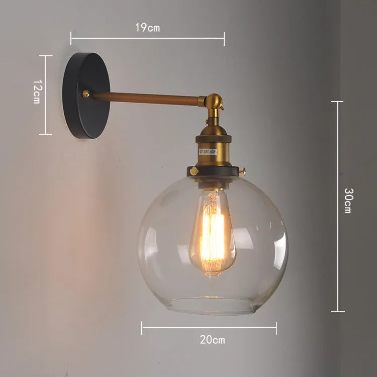Retro round ball glass wall lamp with aluminium holder in amber, smoke grey, or transparent colour