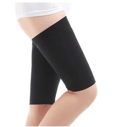 Arm and leg sleeves slimming shaper in black colour, showing wave pattern design on inner surface