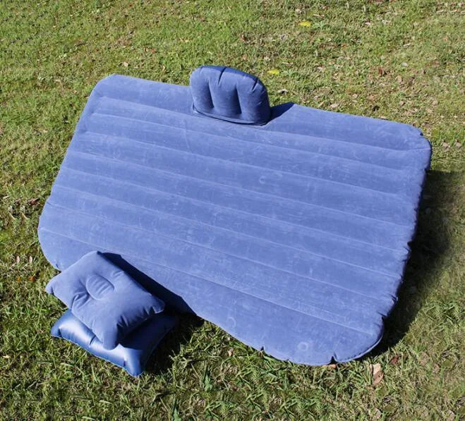 Car inflatable bed with 0.5mm flocking cloth in black wave, including pillows and pump, set up in a car rear seat