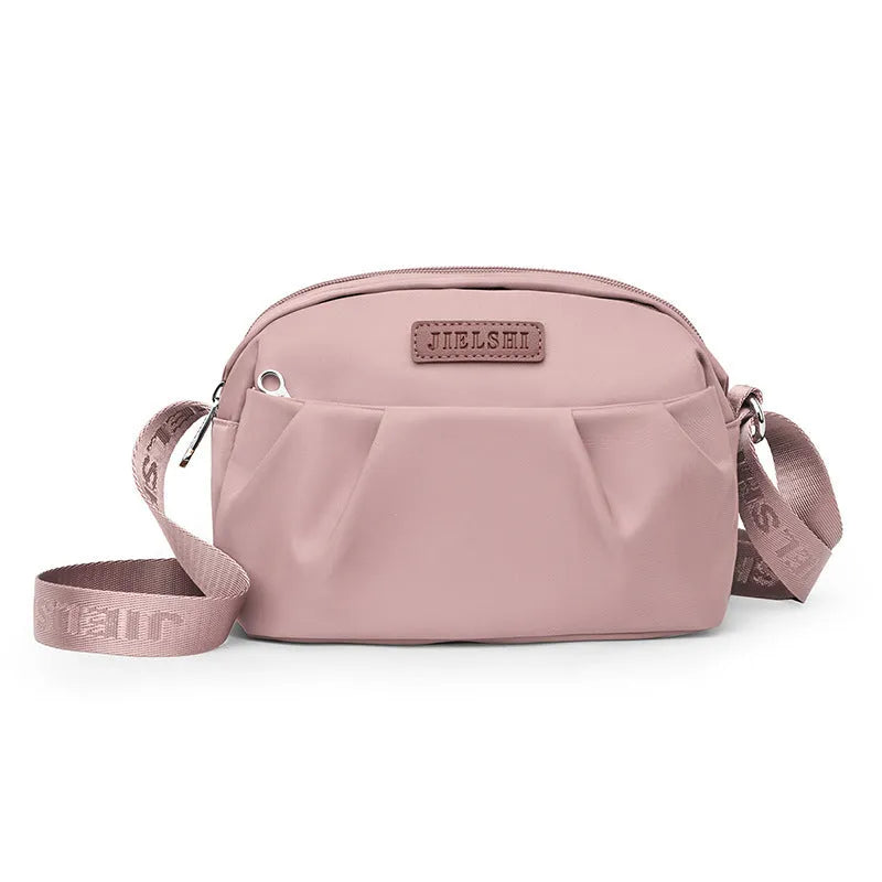Pleated Oxford cloth shoulder messenger phone bag in horizontal square shape with single strap