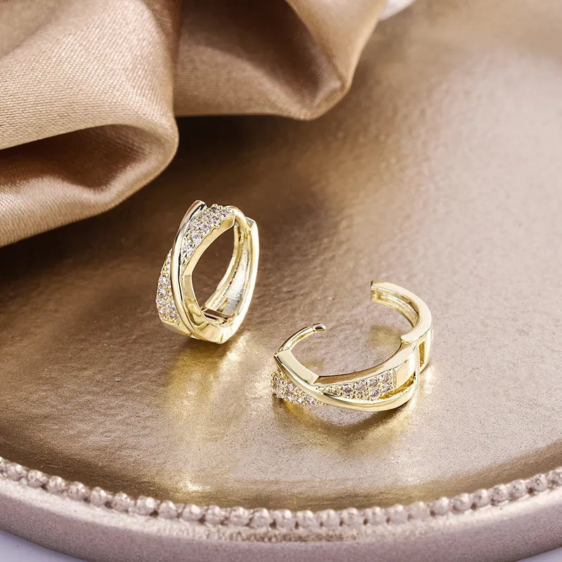 Geometric women's earrings with 14K yellow gold finish and zircon stone details on copper base