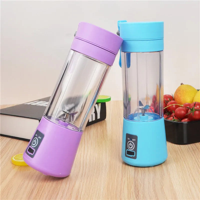 Mini USB electric centrifugal juicer with stainless steel blade, anti-slip base, and rope handle in blue plastic housing