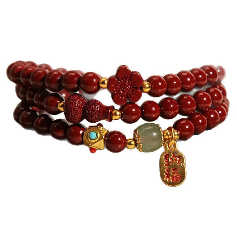 Multi-circle cinnabar bracelet with gourd and five petal flower motifs, polished finish, 6mm beads