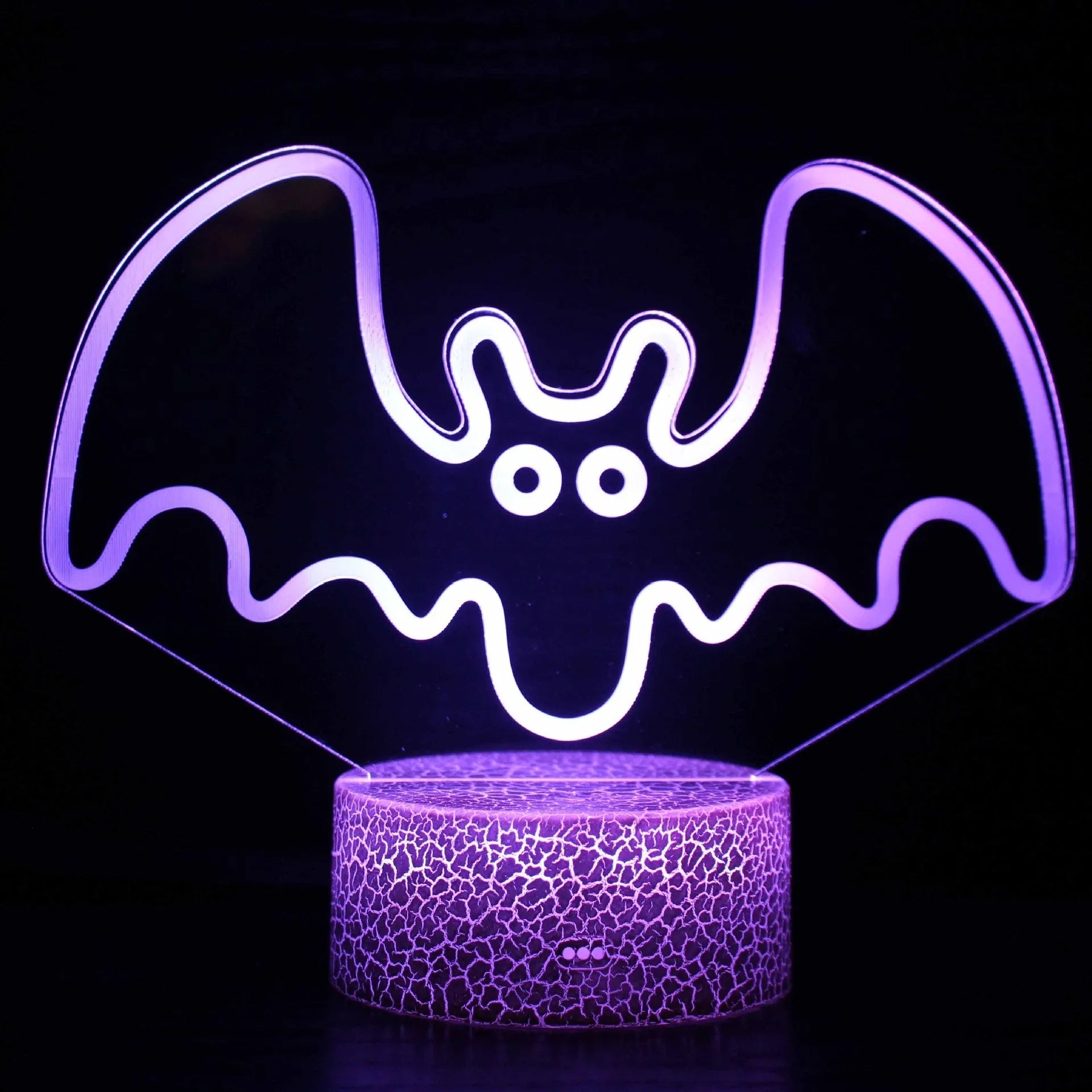 Acrylic 3D table lamp with colourful crack base design and touch controls on wooden surface