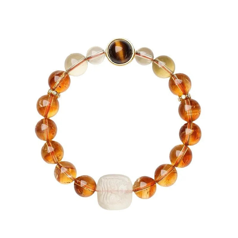 Women's ethnic style carved citrine crystal bracelet with geometric 10mm beads on a white background