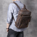 Retro crazy horse leather backpack in dark coffee colour with handmade stitching and front flap
