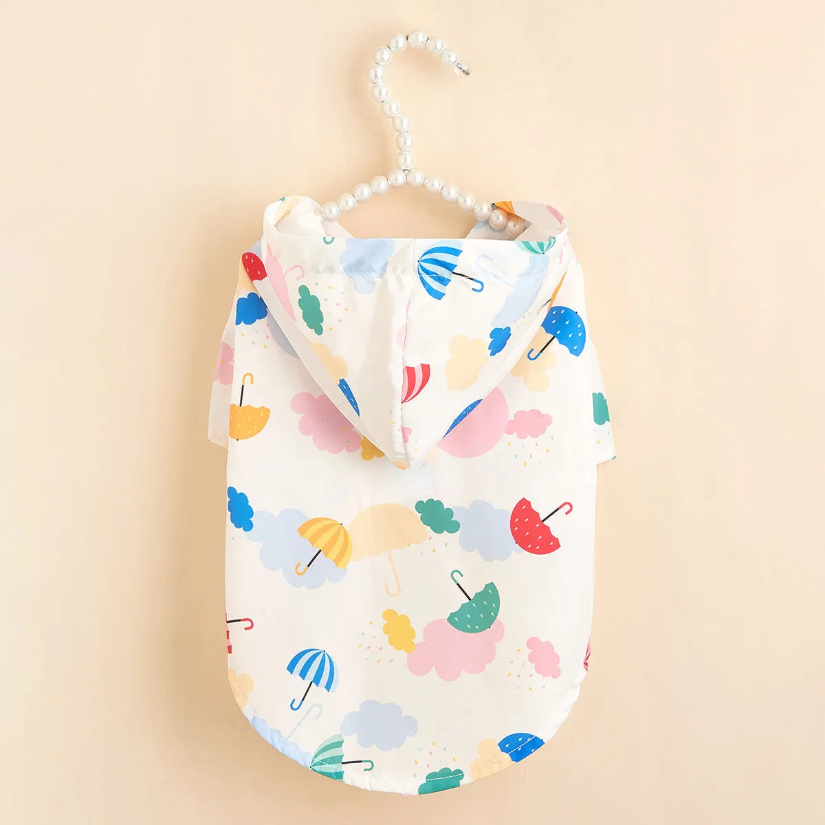 Colourful cartoon umbrella pattern dog raincoat with hood and velcro closures