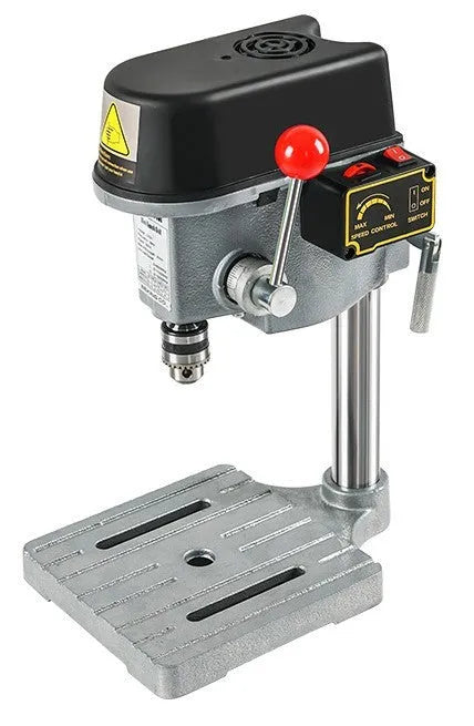 Bench drill and milling machine with cross bench pliers on workbench