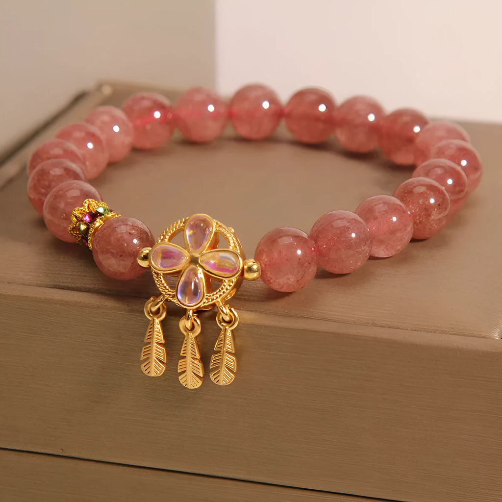 Natural strawberry quartz bracelet with four-leaf clover dream catcher ball pendant on adjustable string