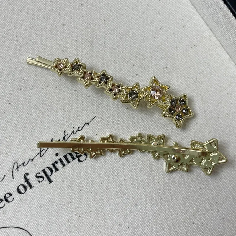Gold electroplated alloy barrette clip with five-pointed star rhinestone design for bangs and hair sections