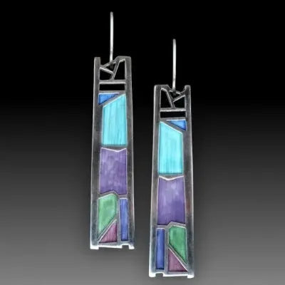 Water drop irregular oil color silver alloy women's drop earrings on white background