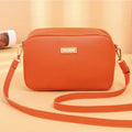 Square-shaped PU ladies' shoulder bag with a three-dimensional front pocket