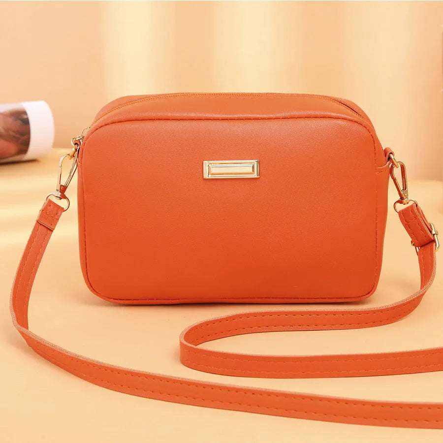 Square-shaped PU ladies' shoulder bag with a three-dimensional front pocket