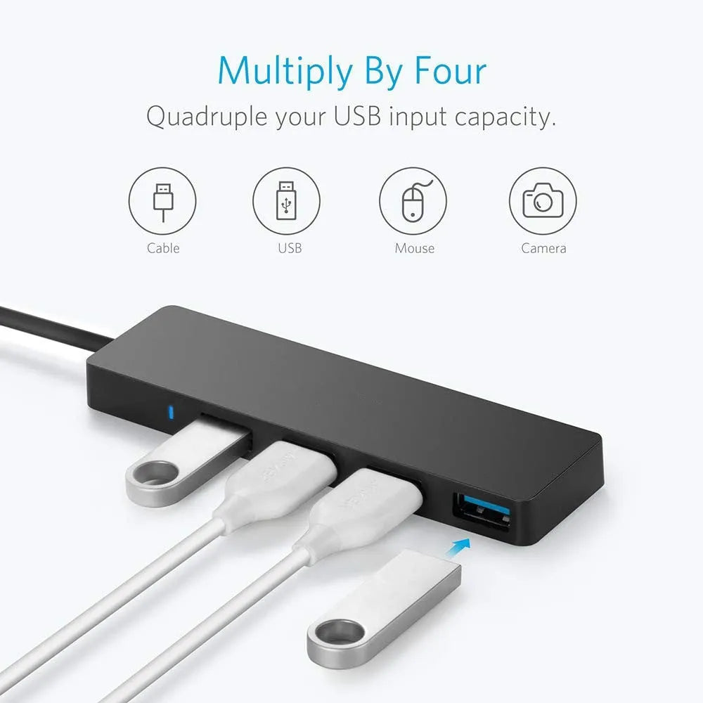 USB 3.0 hub splitter with 4 ports and black LED indicators on a desk
