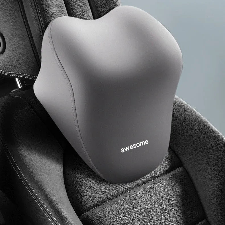 High-grade automotive headrest lumbar support pillow on car seat in beige colour
