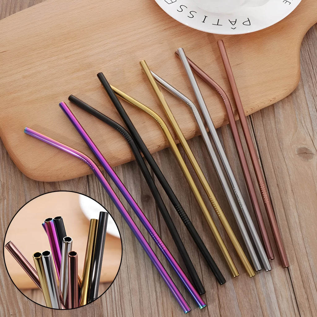 Colourful reusable stainless steel straws with non-slip threads, straight and elbow styles, on a table