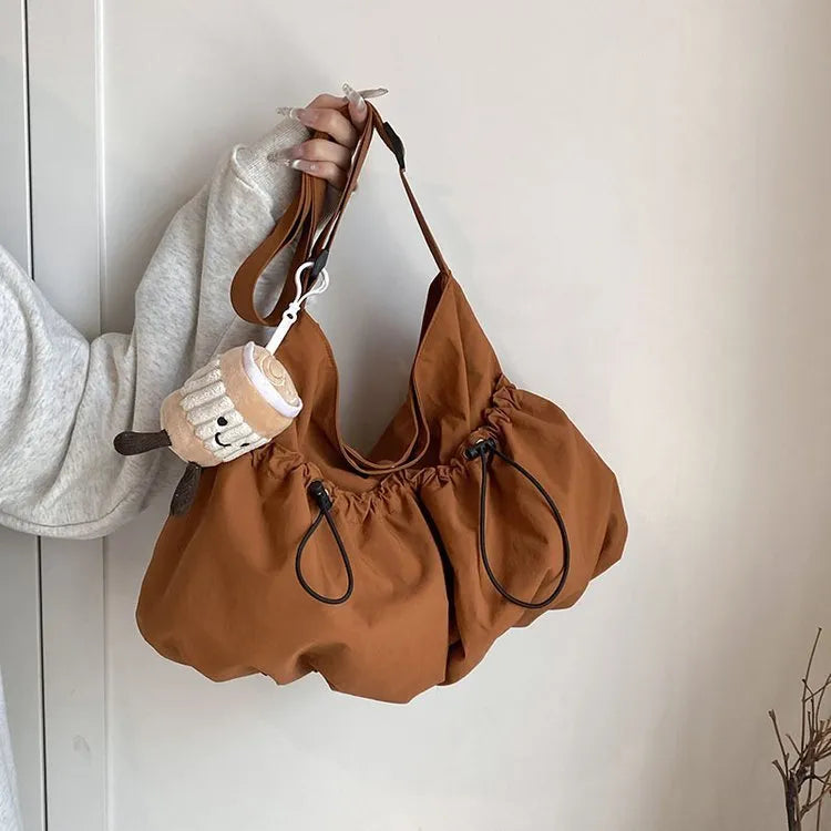 Ultra-light pleated crossbody student bag in polyester cloth with split pocket and mobile phone compartment