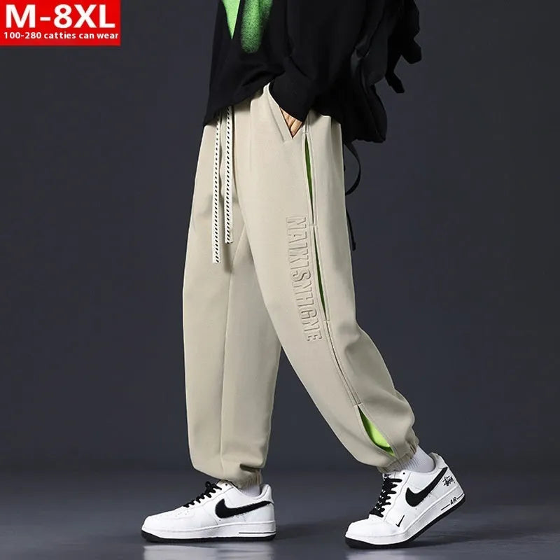 Men's cotton ankle banded pants with collage stitching printing in loose fit design
