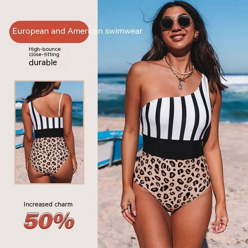 Women's leopard print one-piece swimsuit with asymmetric collar and high-waist brief design.