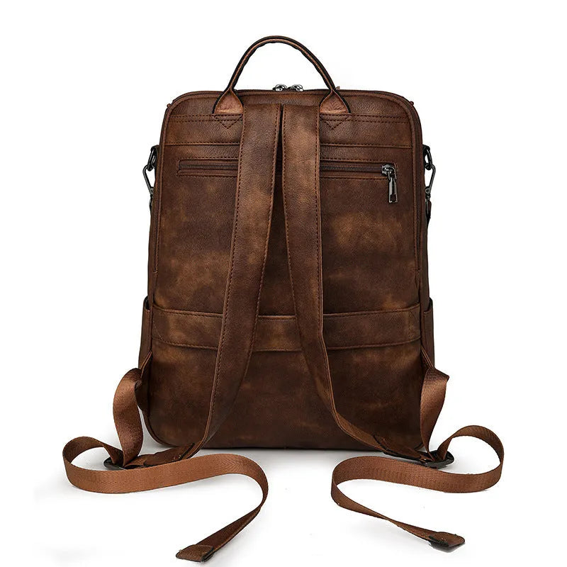 Retro style PU backpack with curved shoulder straps in one of six colour options