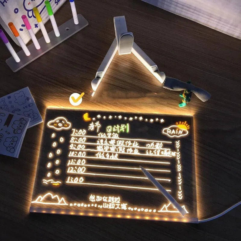 Acrylic DIY note board LED night light showing a transparent board with written messages, USB power, and bracket setup