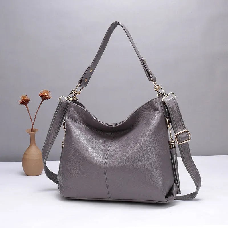 Genuine leather crossbody bag in vertical square shape with internal organisers and crossbody strap