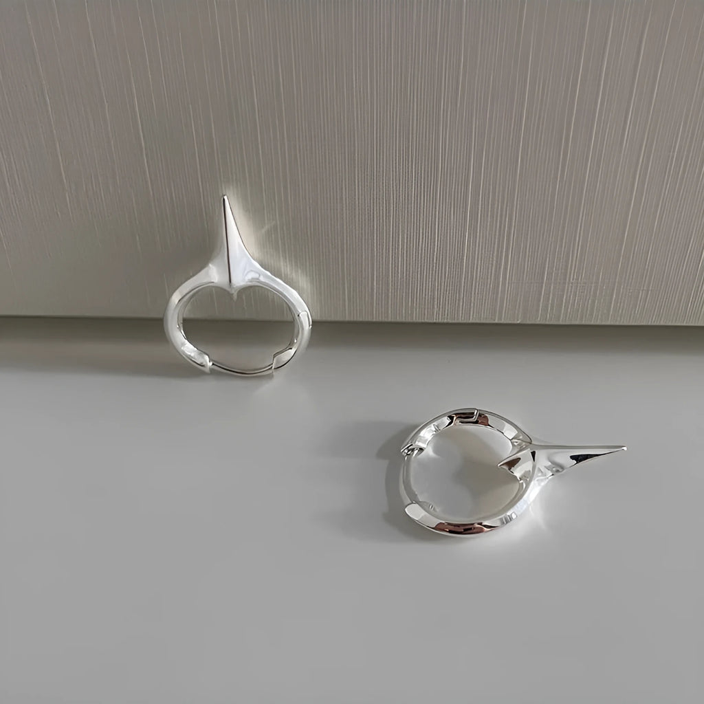 Geometric star design women's ear clips with copper construction and electroplated white gold finish