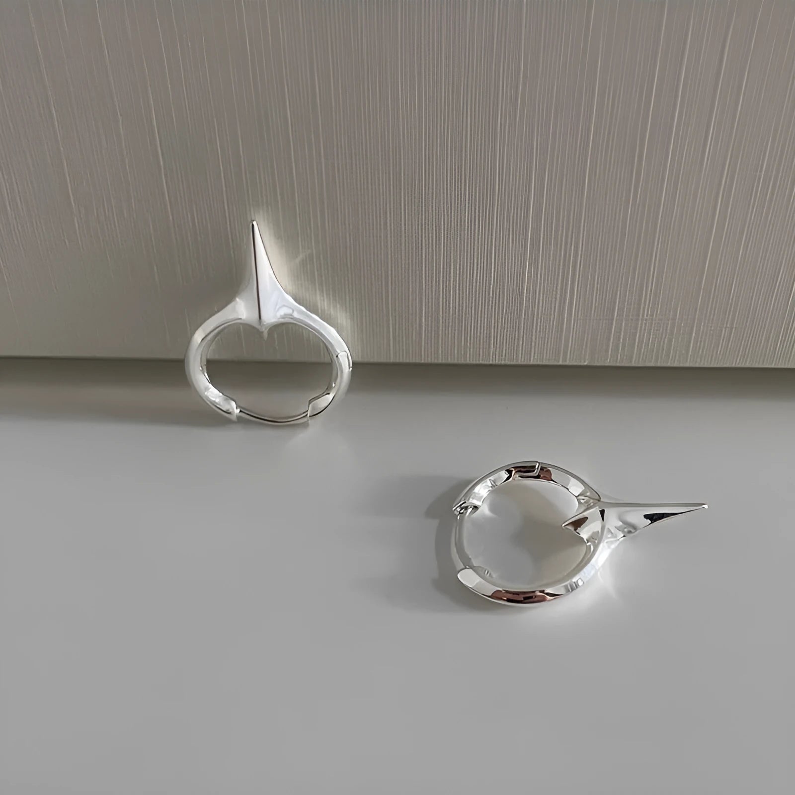 Geometric star design women's ear clips with copper construction and electroplated white gold finish