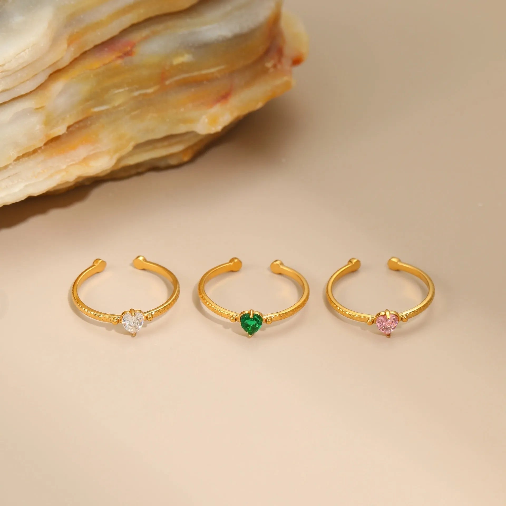 Open-ended stainless steel heart ring with zircon stones in geometric design