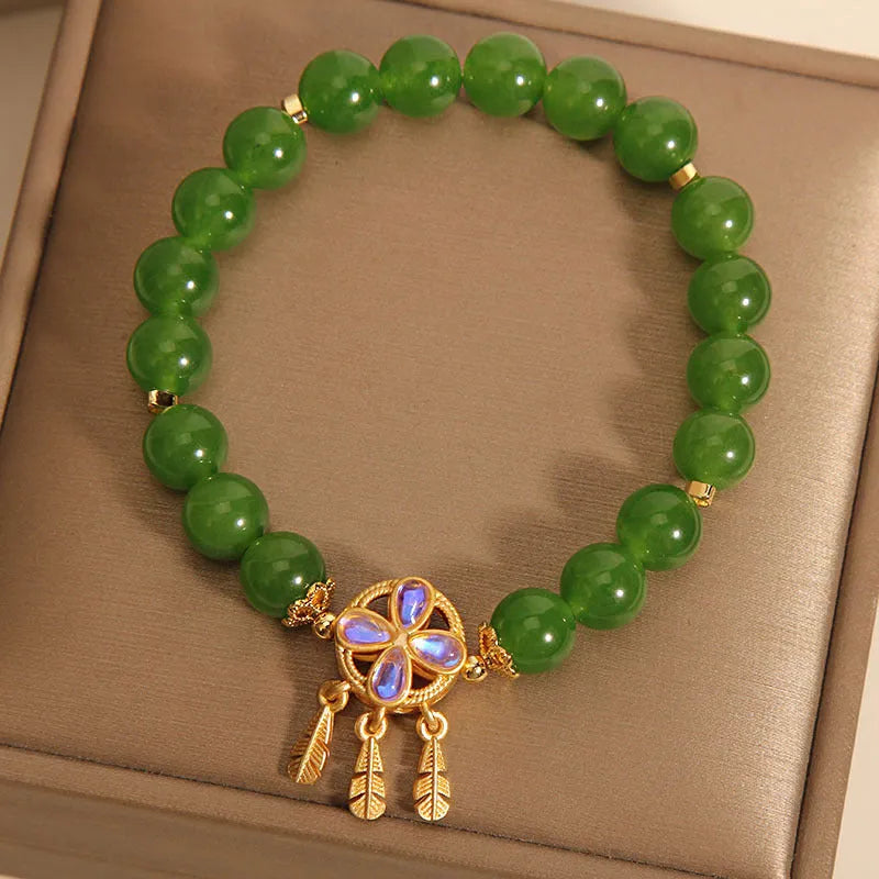 Women's green jasper bracelet with four-leaf clover and dream catcher crystal pendant