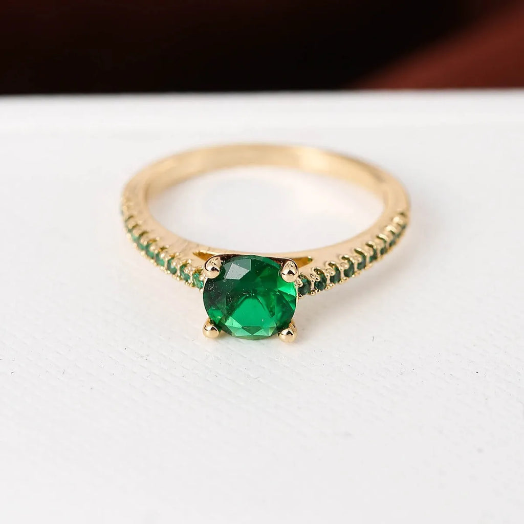 A hexagonal geometric ring made of copper with an electroplated finish, shown in a gold rose red colour.