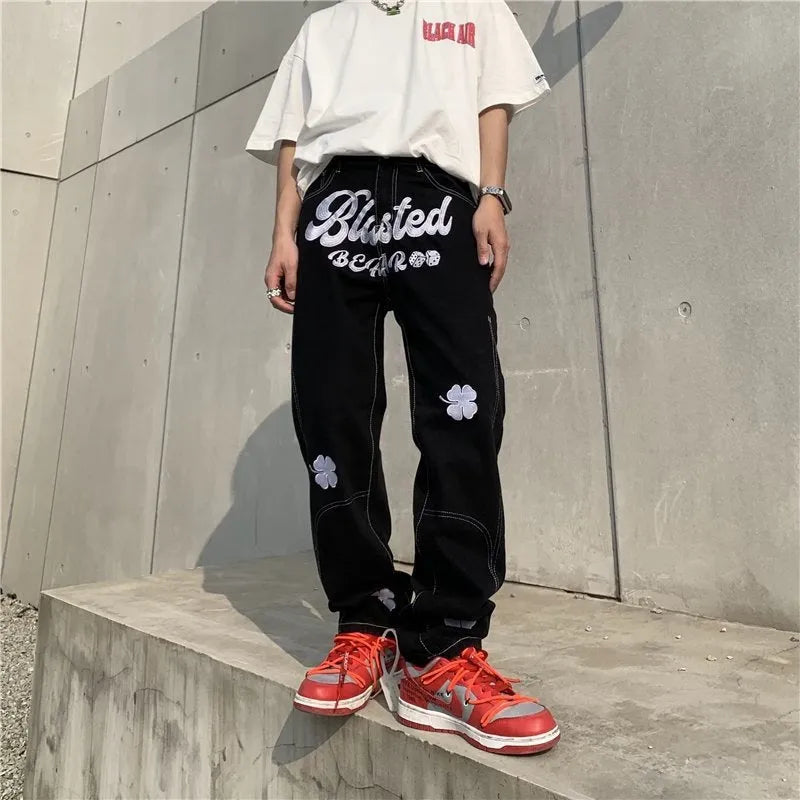 Men's American retro printed casual trousers with button placket and small straight leg in graphic colour