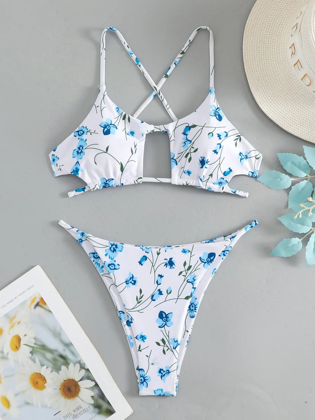Women's floral tie-neck triangle swimsuit set with polyester lining and matching shorts in multiple colours sizes XS to XL.