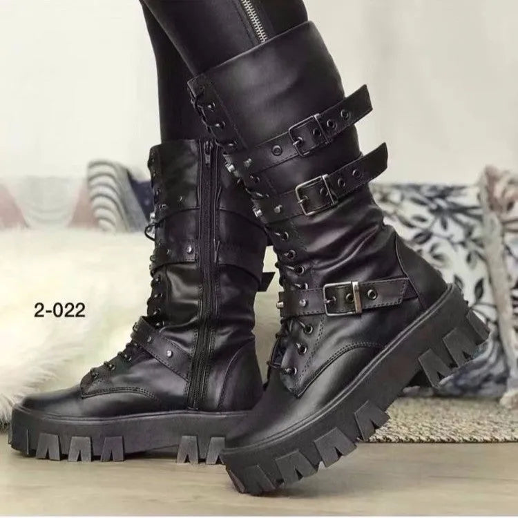 Women's black mid-calf boots with metal buckle strap and side zip on a white background.