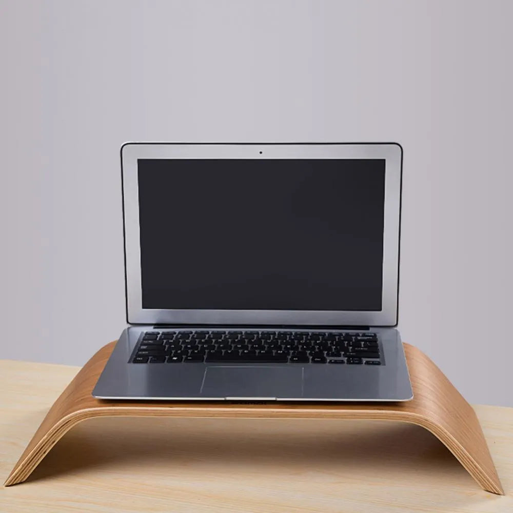 Walnut wood laptop stand with bamboo leather colour finish, 23x51x9cm dimensions, on a desk