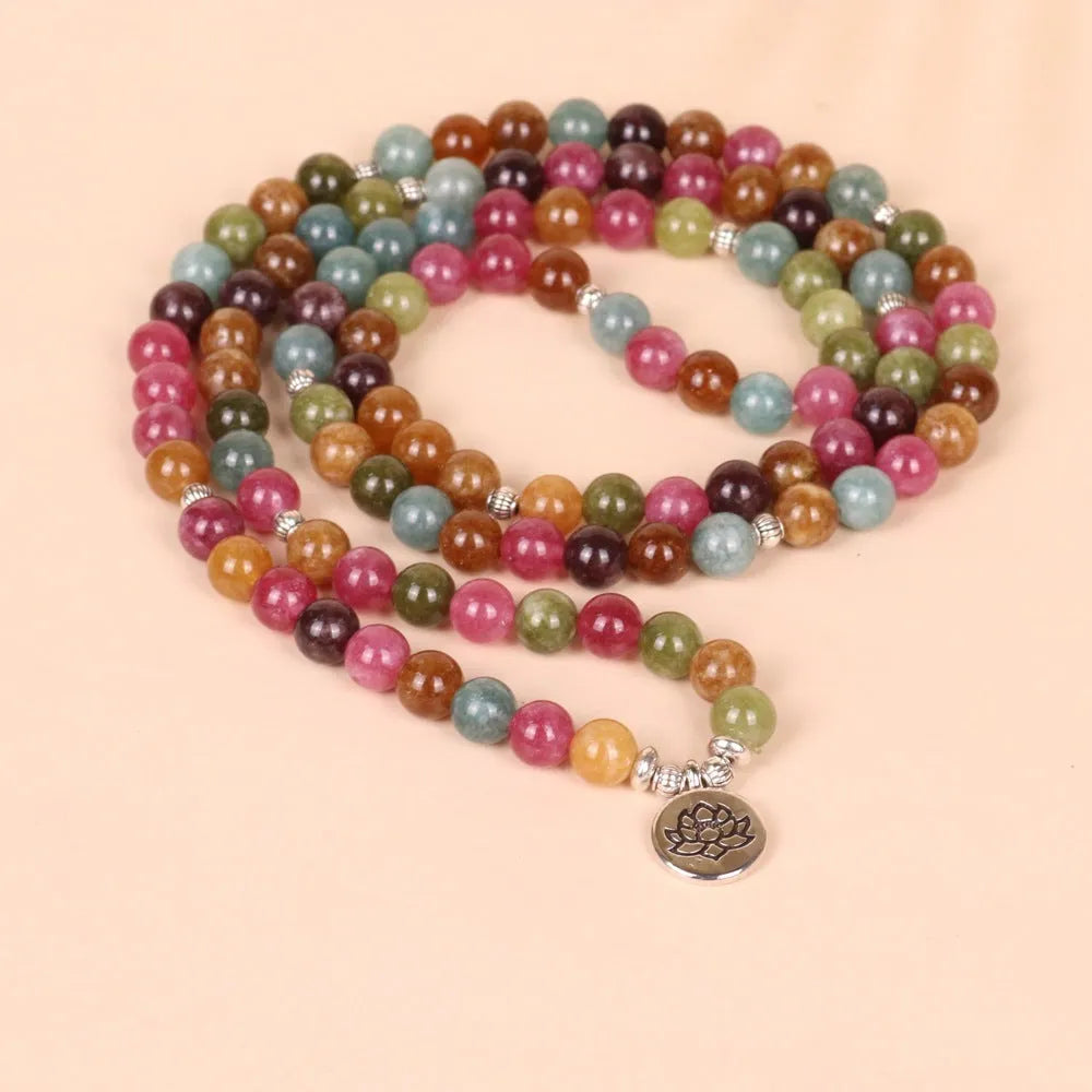 Tourmaline coloured 108-bead alloy bracelet with multi-layer lotus hanging design on adjustable string.