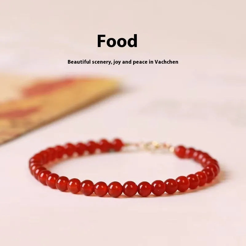 Ultra-thin red agate calm small bracelet for women classic style on neutral background