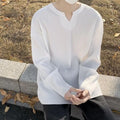 Plus size women's striped texture draping solid colour pullover top in black, loose fit, long sleeves, polyester knit